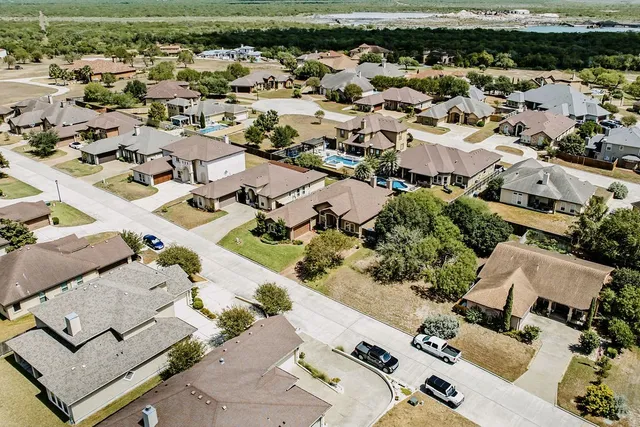 an aerial view of a city with lots of residential buildings