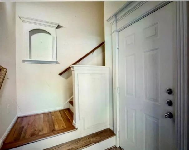 a view of front door with stairs