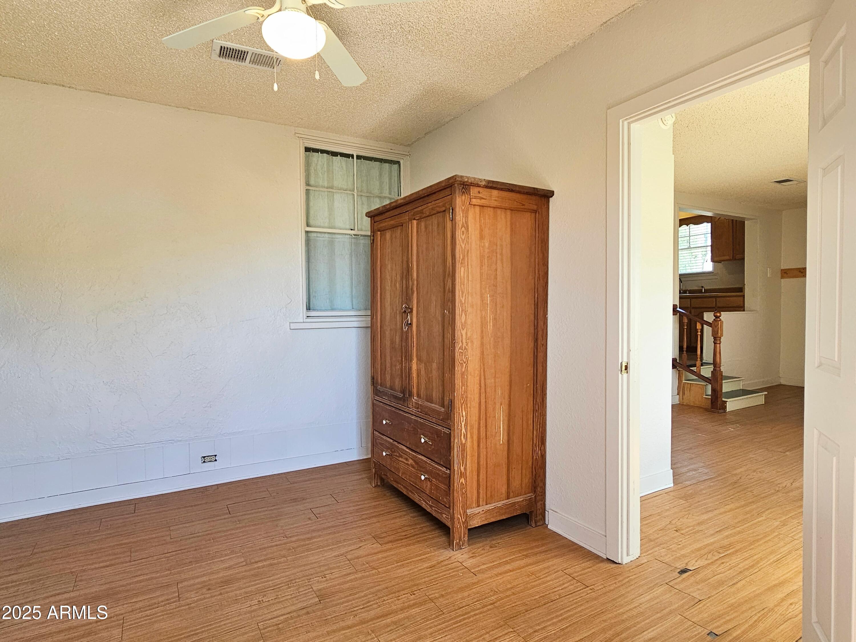 11 Bornite Avenue Bisbee, AZ 85603 - Photo 13 of 28 a view of a room with wooden floor