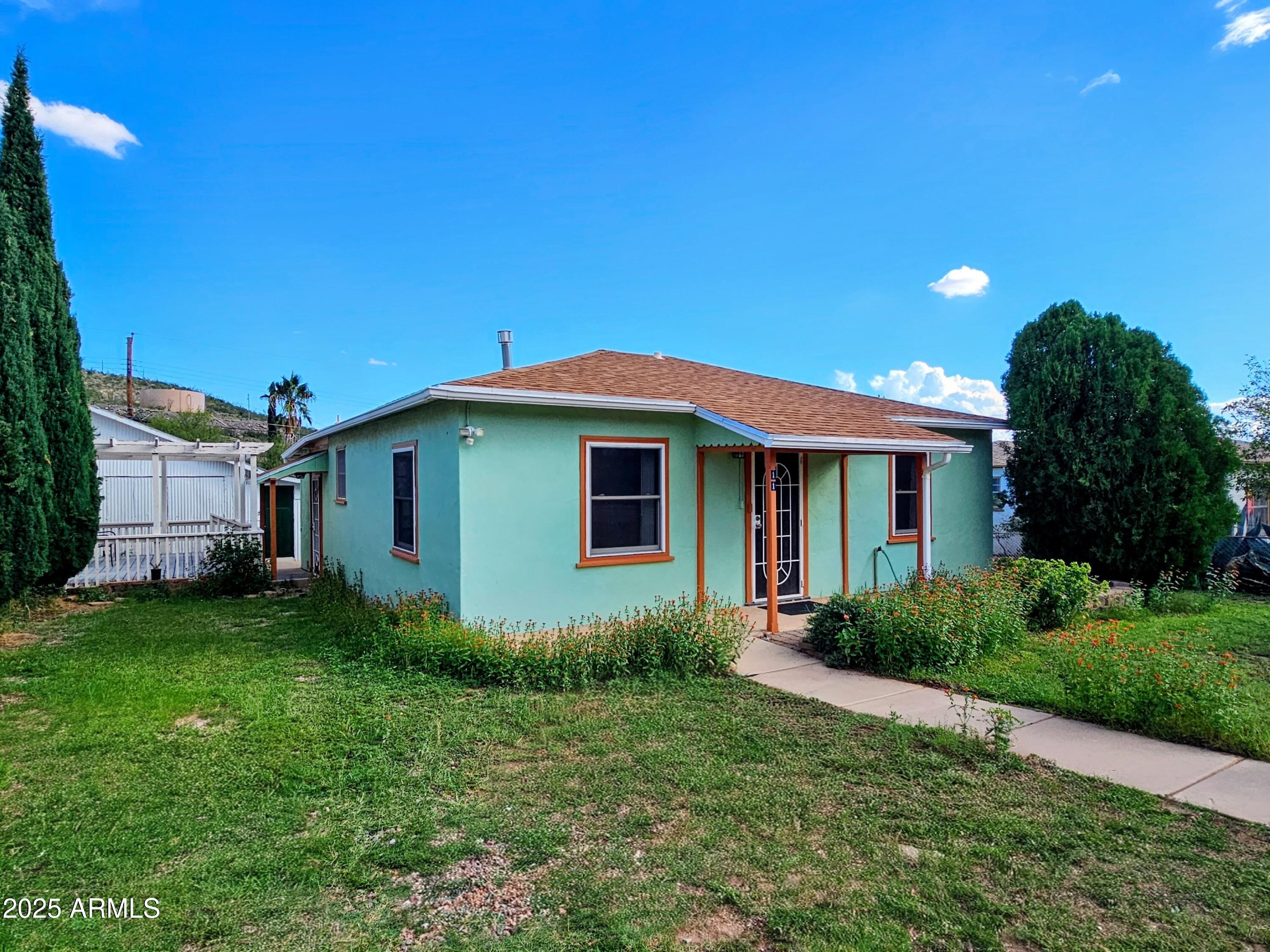 11 Bornite Avenue Bisbee, AZ 85603 - Photo 2 of 28 a view of a house with a yard