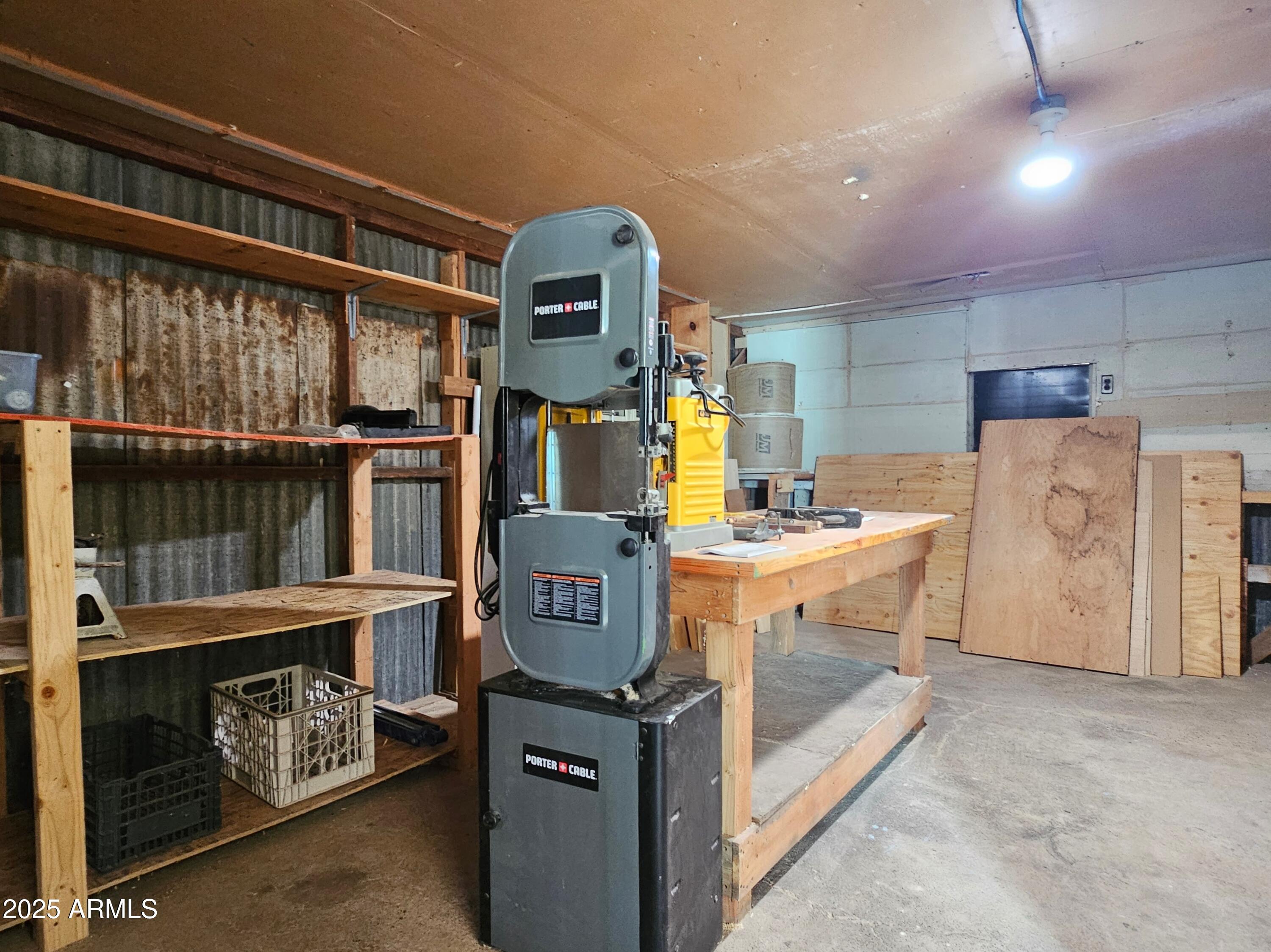 11 Bornite Avenue Bisbee, AZ 85603 - Photo 24 of 28 a kitchen with a stove and a white refrigerator
