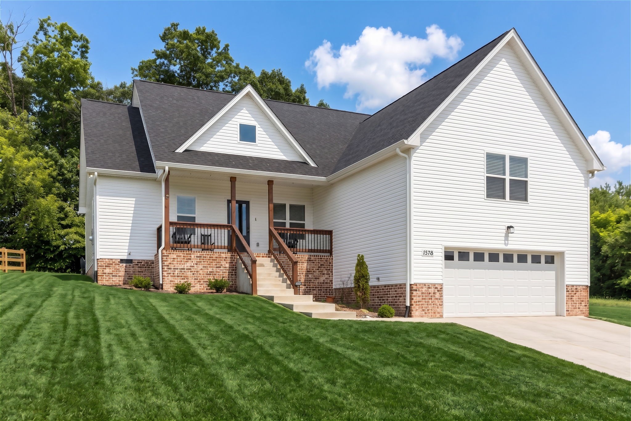 1578 Angus Way Greenbrier, TN 37073 - Photo 1 of 45 a front view of house with yard and outdoor seating