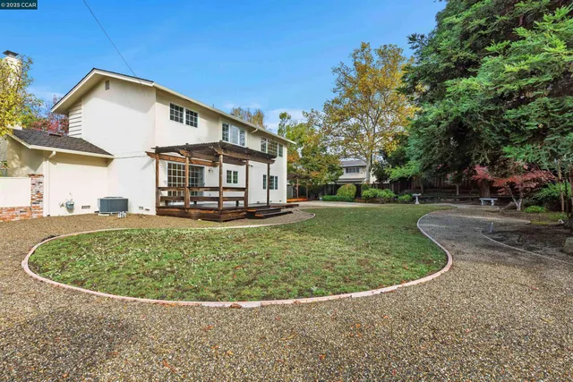 a view of a house with a swimming pool