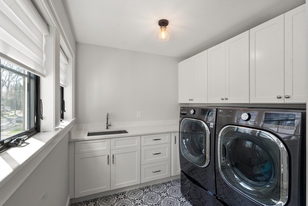 7 Massasoit Road Wellesley, MA 02481 - Photo 32 of 42 a utility room with sink dryer and washer