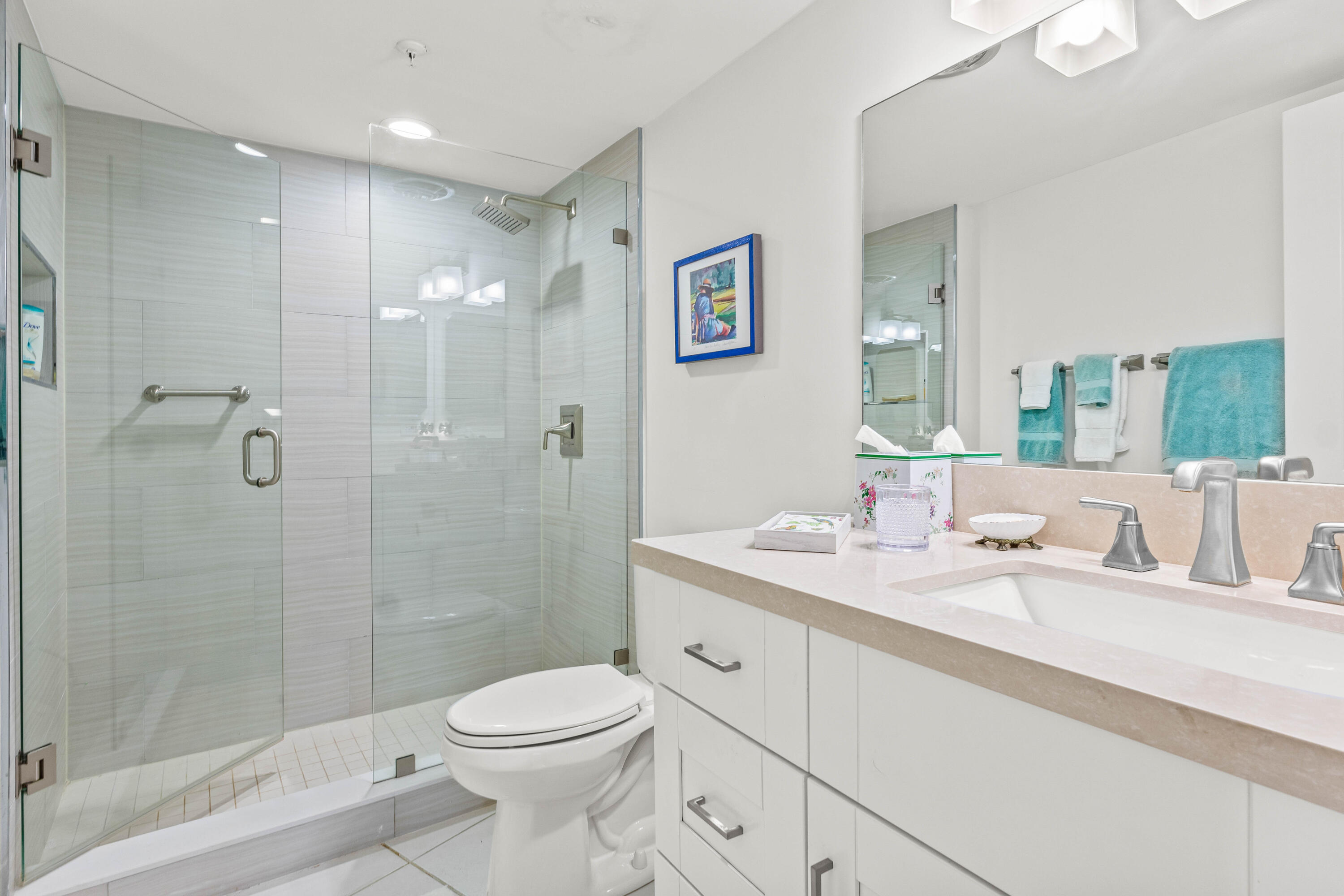 3360 South Ocean Boulevard, Unit 3 A I Palm Beach, FL 33480 - Photo 10 of 22 a bathroom with a sink a toilet and shower