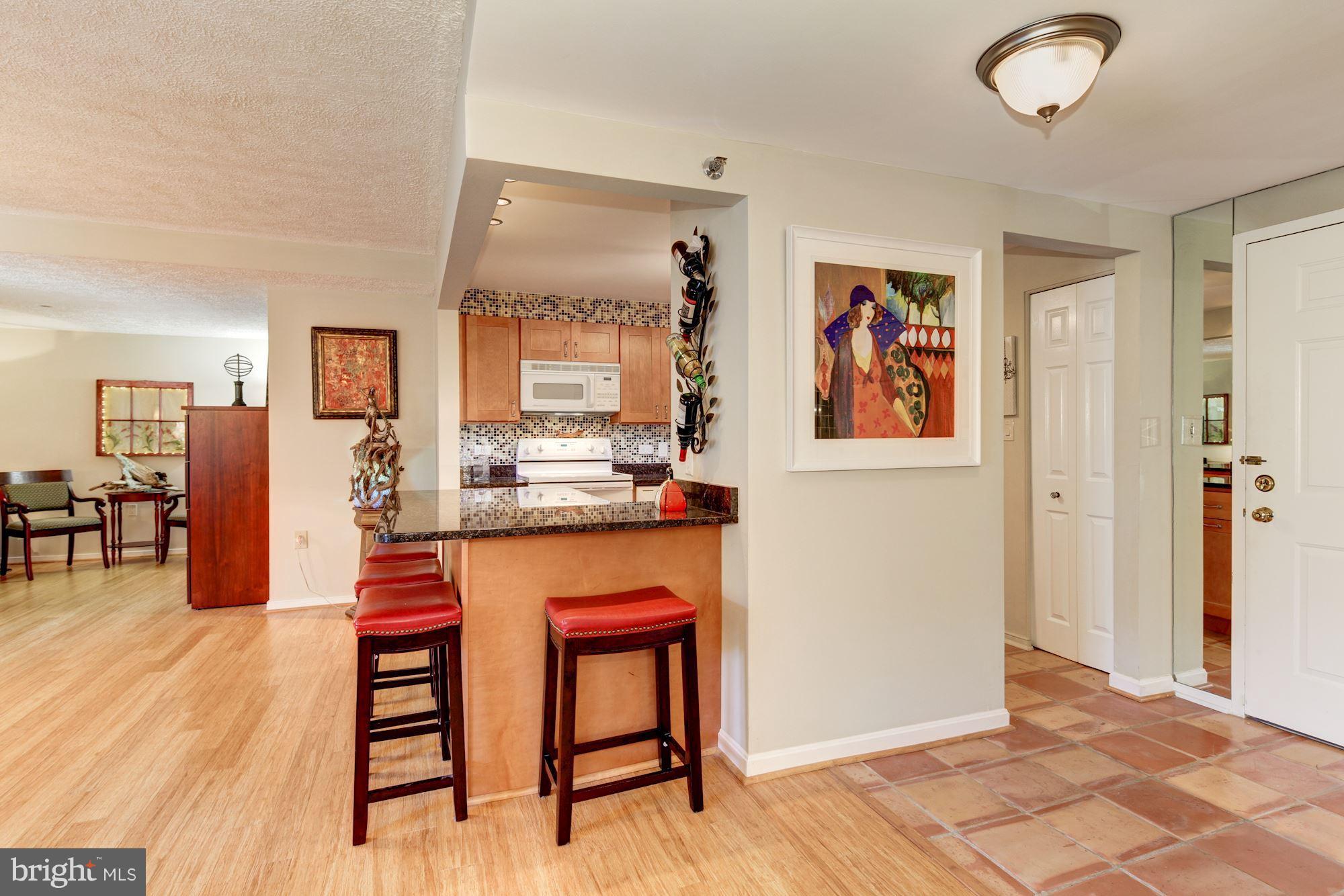 2331 Old Court Road, Unit 200 Baltimore, MD 21208 - Photo 14 of 28 Ceramic Tile Floor into the Foyer