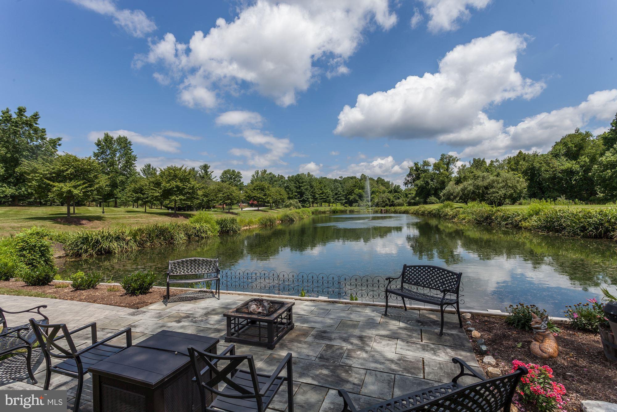2331 Old Court Road, Unit 200 Baltimore, MD 21208 - Photo 27 of 28 Common Pond w/Fountain/Patio w/Lawn Furniture