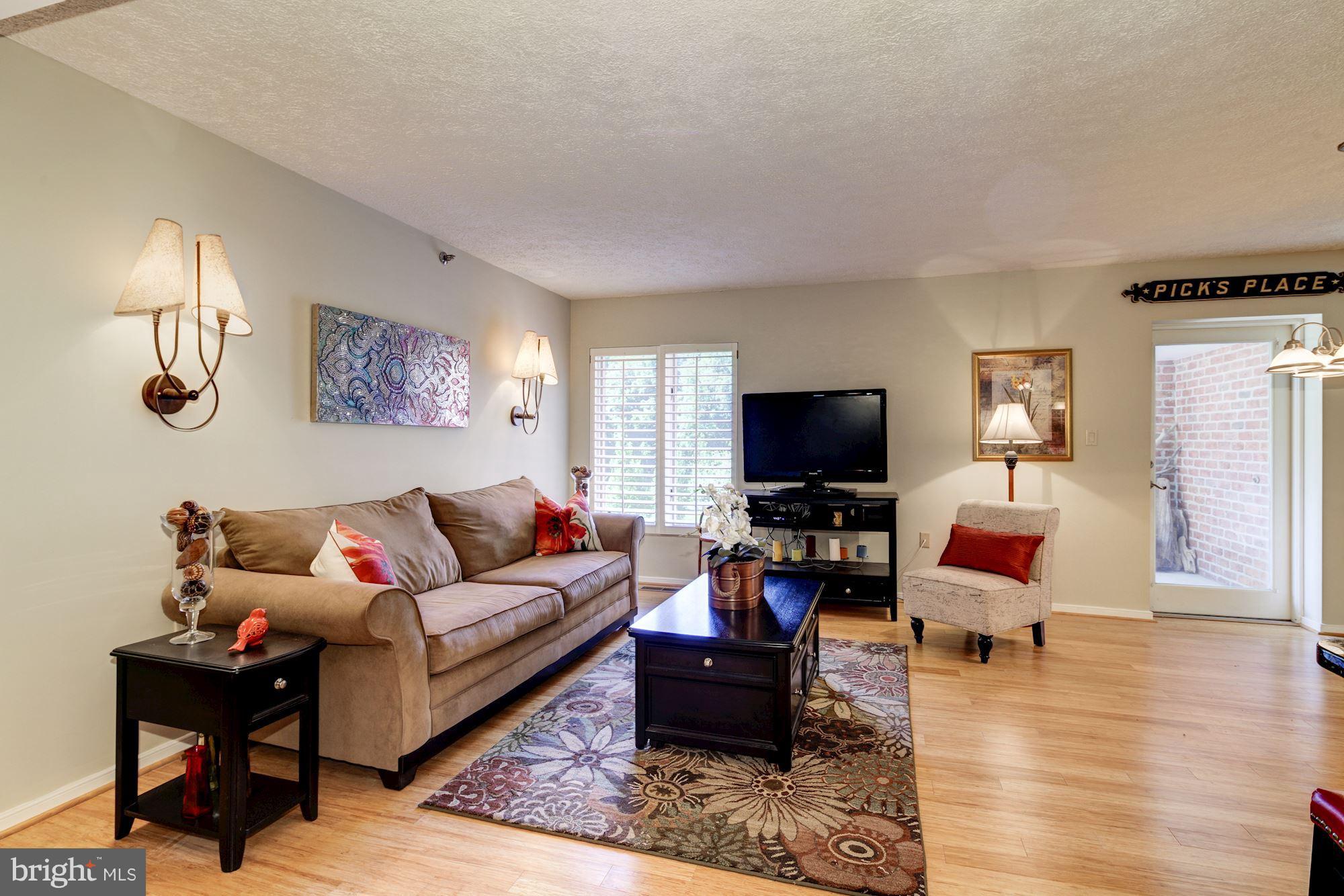 2331 Old Court Road, Unit 200 Baltimore, MD 21208 - Photo 4 of 28 Family Room Area/"Bamboo" Pergo