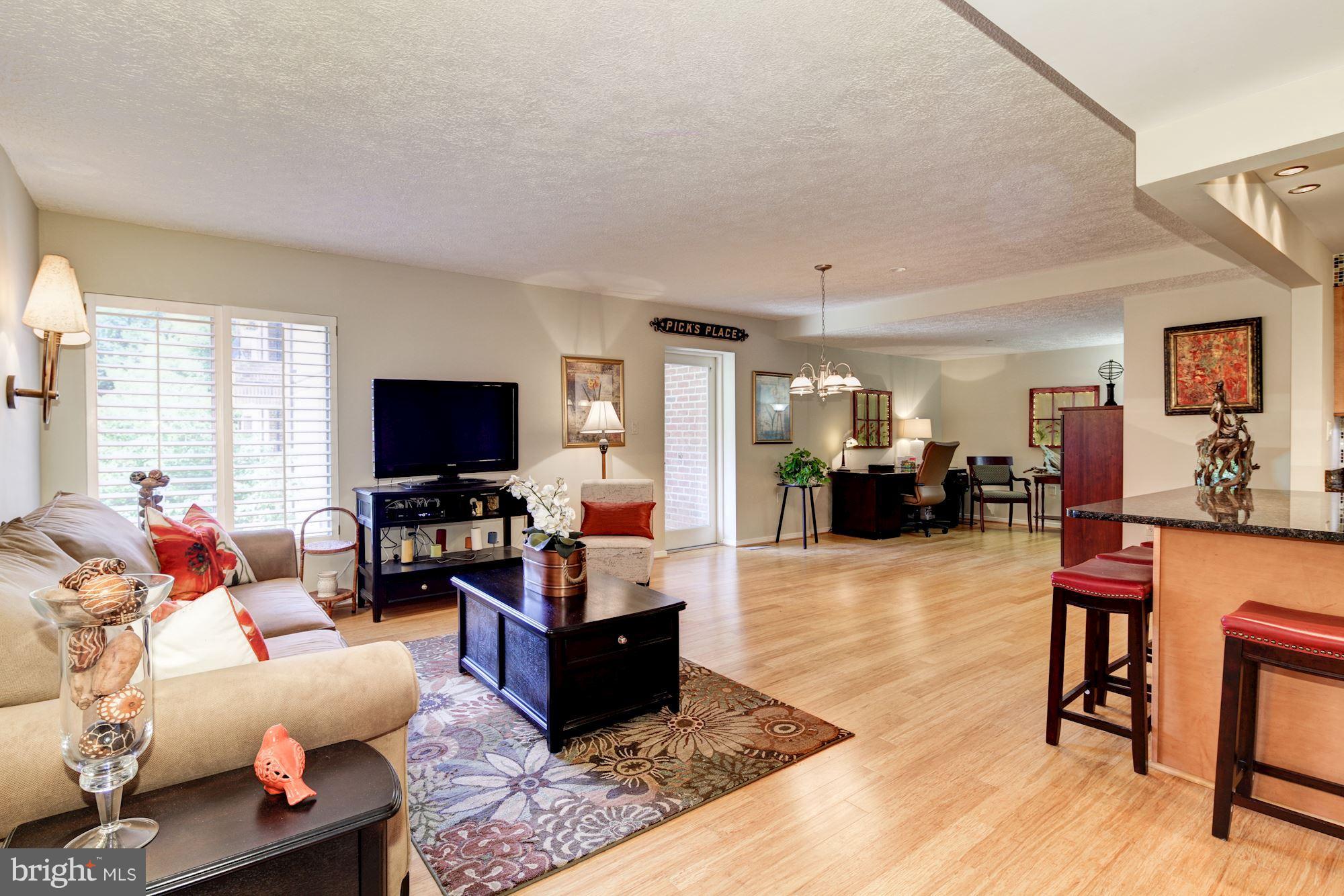 2331 Old Court Road, Unit 200 Baltimore, MD 21208 - Photo 5 of 28 Family Room w/Door to Balcony