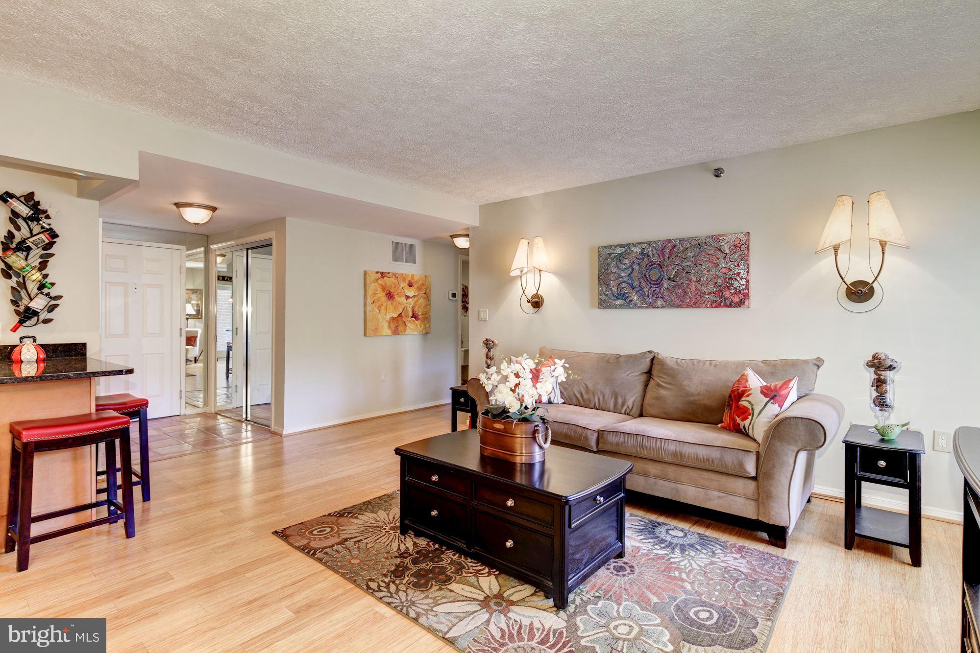 2331 Old Court Road, Unit 200 Baltimore, MD 21208 - Photo 7 of 28 Family Room w/Sconce, Decorative Lighting