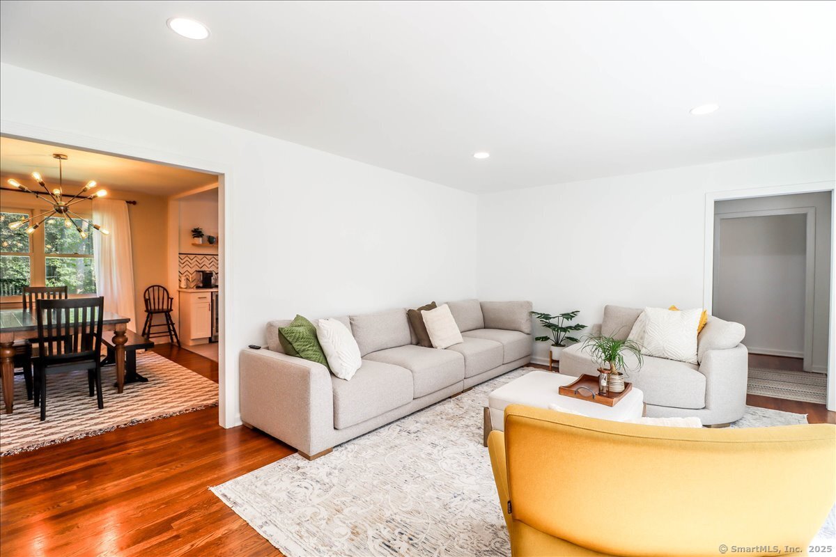46 White Birch Road Ridgefield, CT 06877 - Photo 14 of 31 a living room with furniture and a table