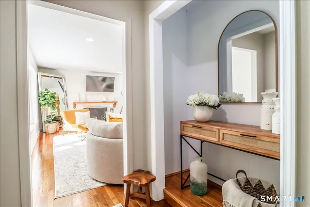 a living room with furniture and a table