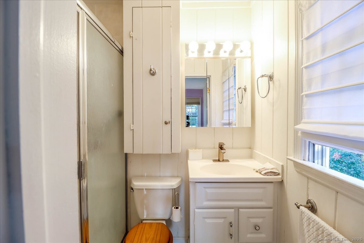 46 White Birch Road Ridgefield, CT 06877 - Photo 23 of 31 a bathroom with a sink toilet and vanity