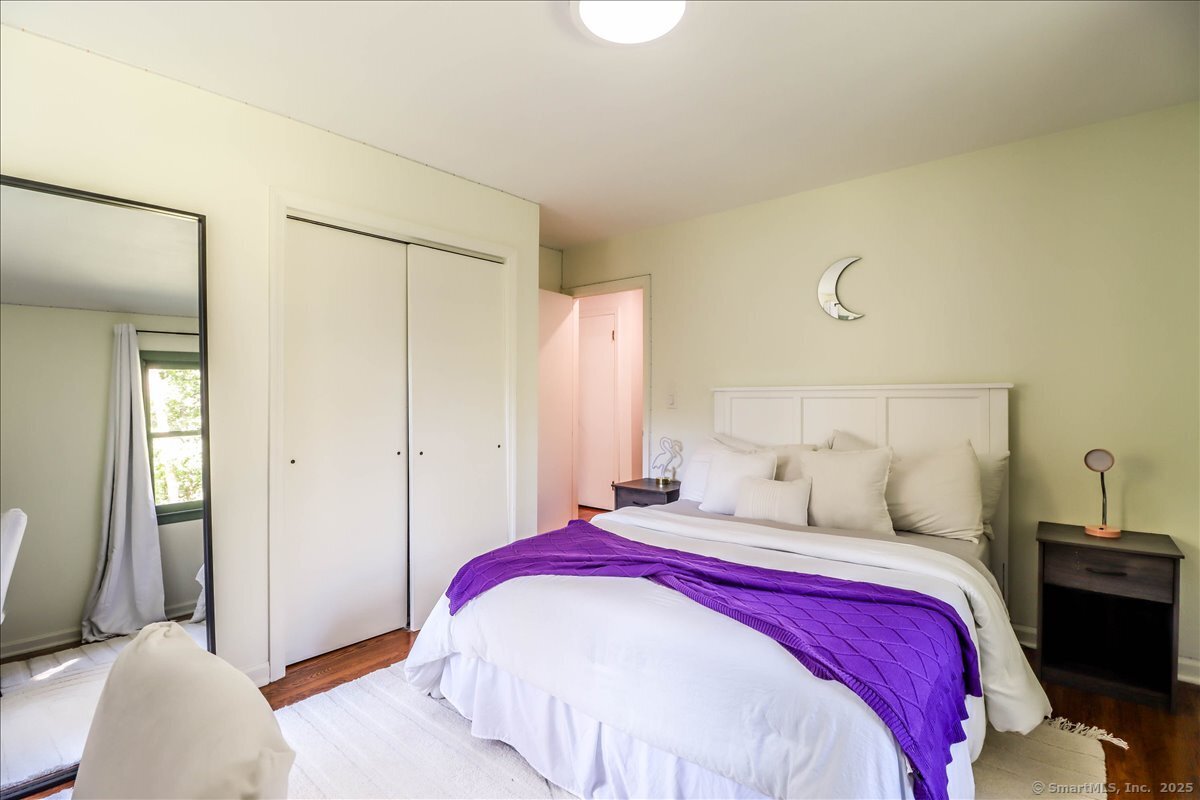 46 White Birch Road Ridgefield, CT 06877 - Photo 27 of 31 a bedroom with a bed and a window