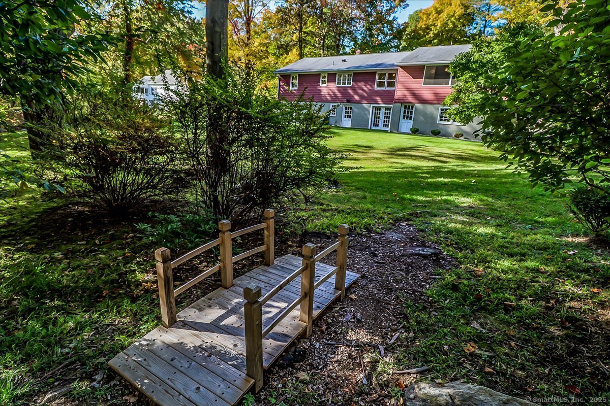 46 White Birch Road Ridgefield, CT 06877 - Photo 31 of 31 a view of a chairs in a backyard