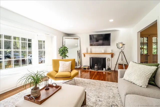 a living room with furniture and a table