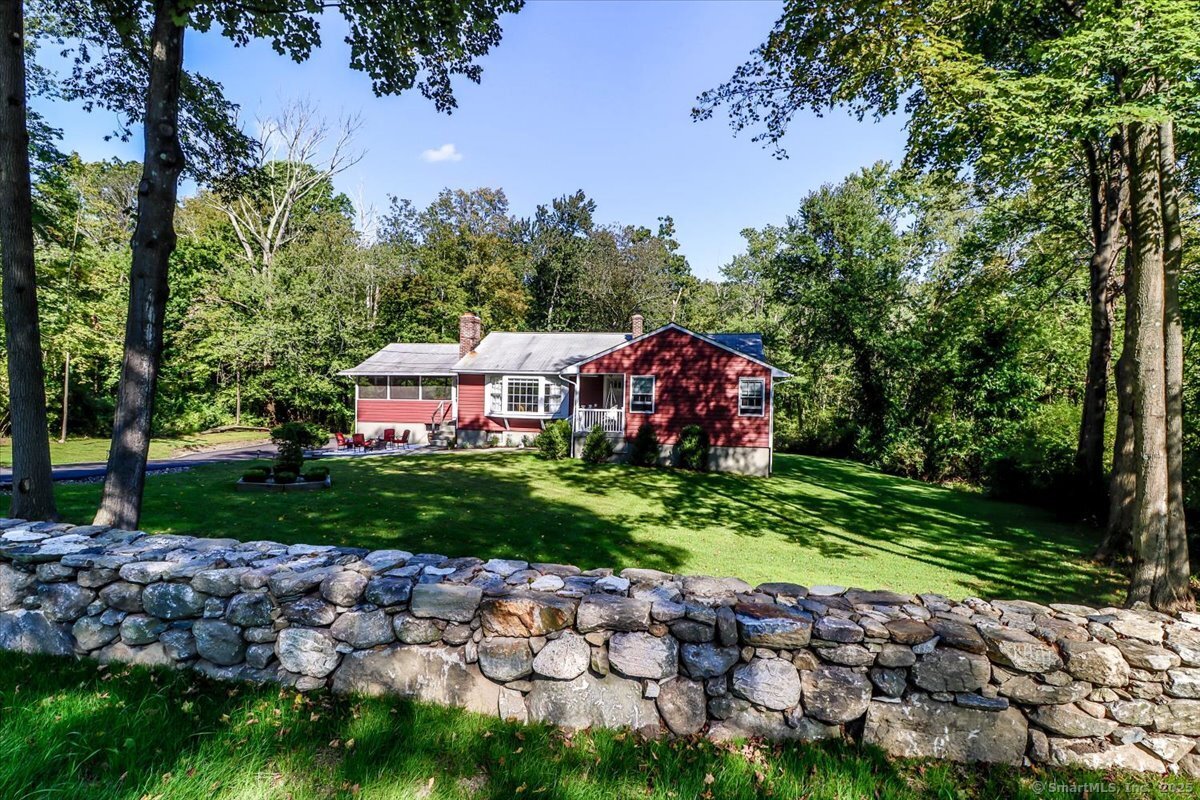 46 White Birch Road Ridgefield, CT 06877 - Photo 5 of 31 a view of a barn with a yard