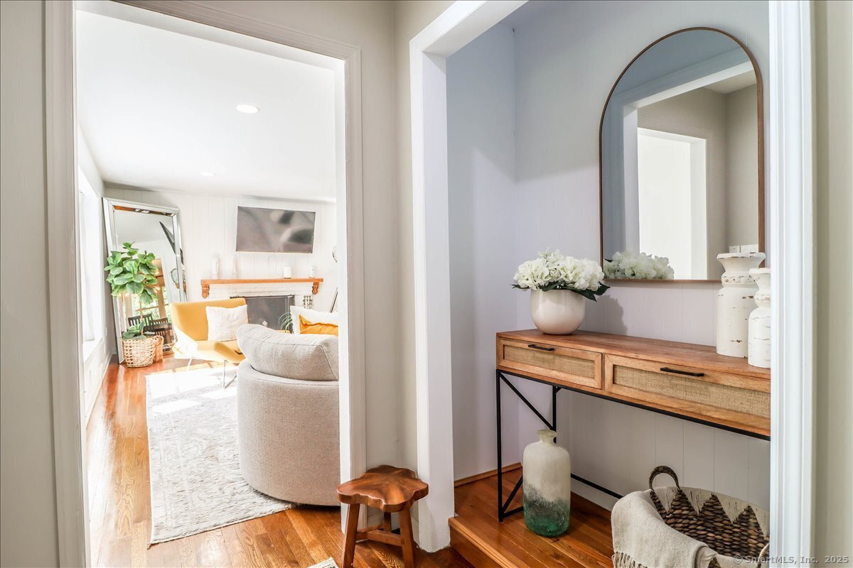 46 White Birch Road Ridgefield, CT 06877 - Photo 10 of 31 a living room with furniture and a wooden floor