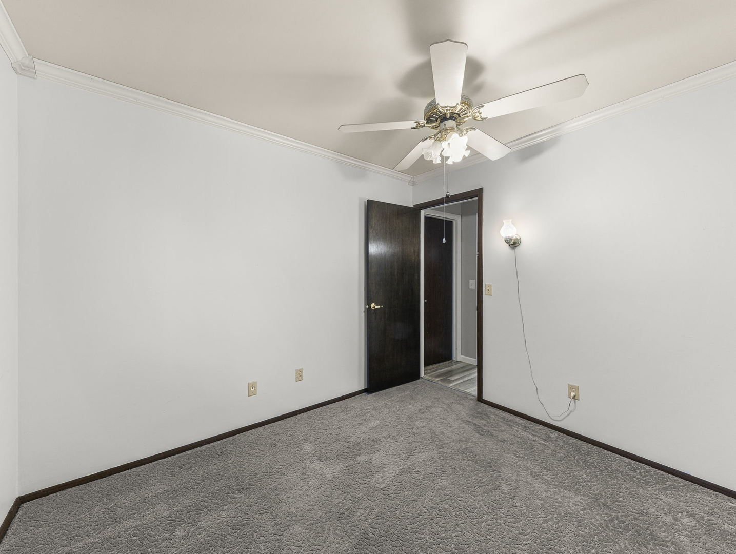 16 Shermead Road Montgomery, IL 60538 - Photo 15 of 22 an empty room with a chandelier fan and closet