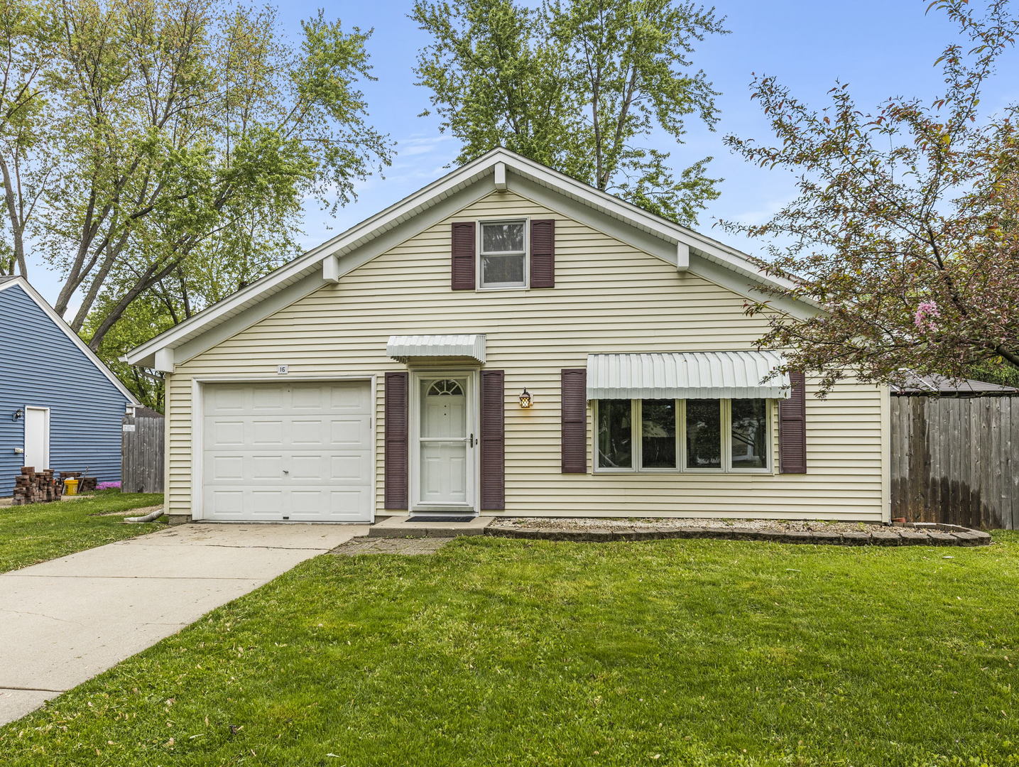 16 Shermead Road Montgomery, IL 60538 - Photo 2 of 22 a view of an house with backyard space and garden