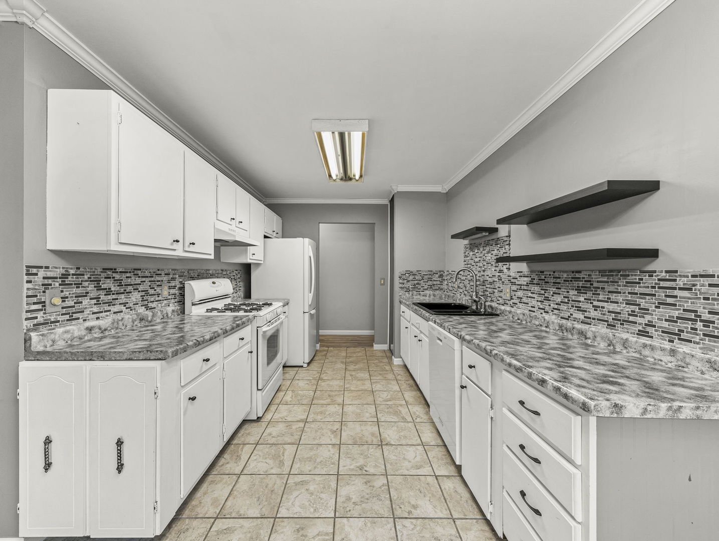 16 Shermead Road Montgomery, IL 60538 - Photo 9 of 22 a large kitchen with granite countertop a sink and cabinets