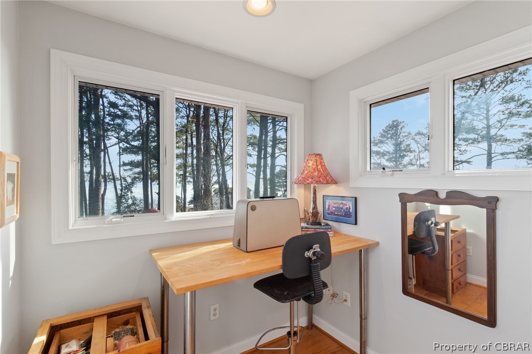 54 Murphy Street Reedville, VA 22539 - Photo 31 of 50 a workspace with furniture and a window
