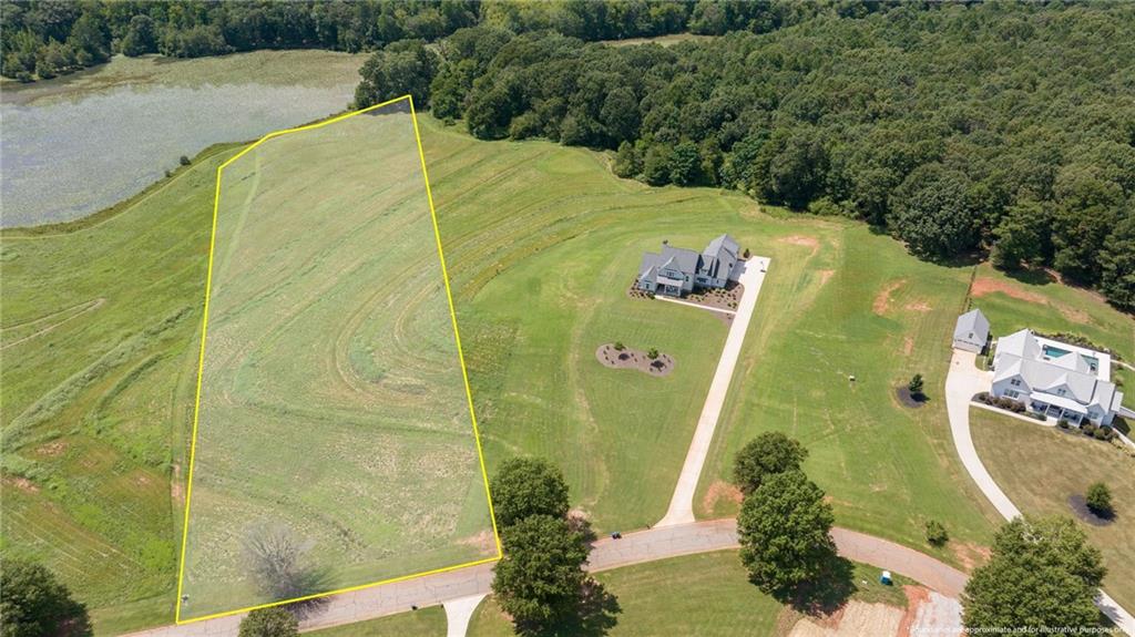 825 North Hampton Way Monroe, GA 30656 - Photo 2 of 31 a view of a swimming pool with a yard