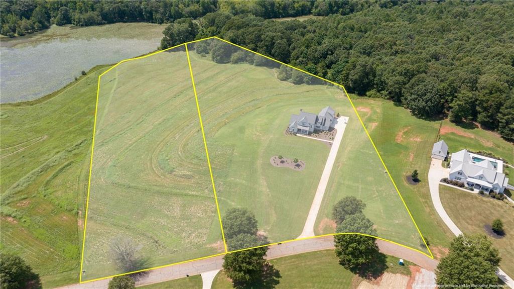 825 North Hampton Way Monroe, GA 30656 - Photo 29 of 31 a view of a swimming pool with a yard