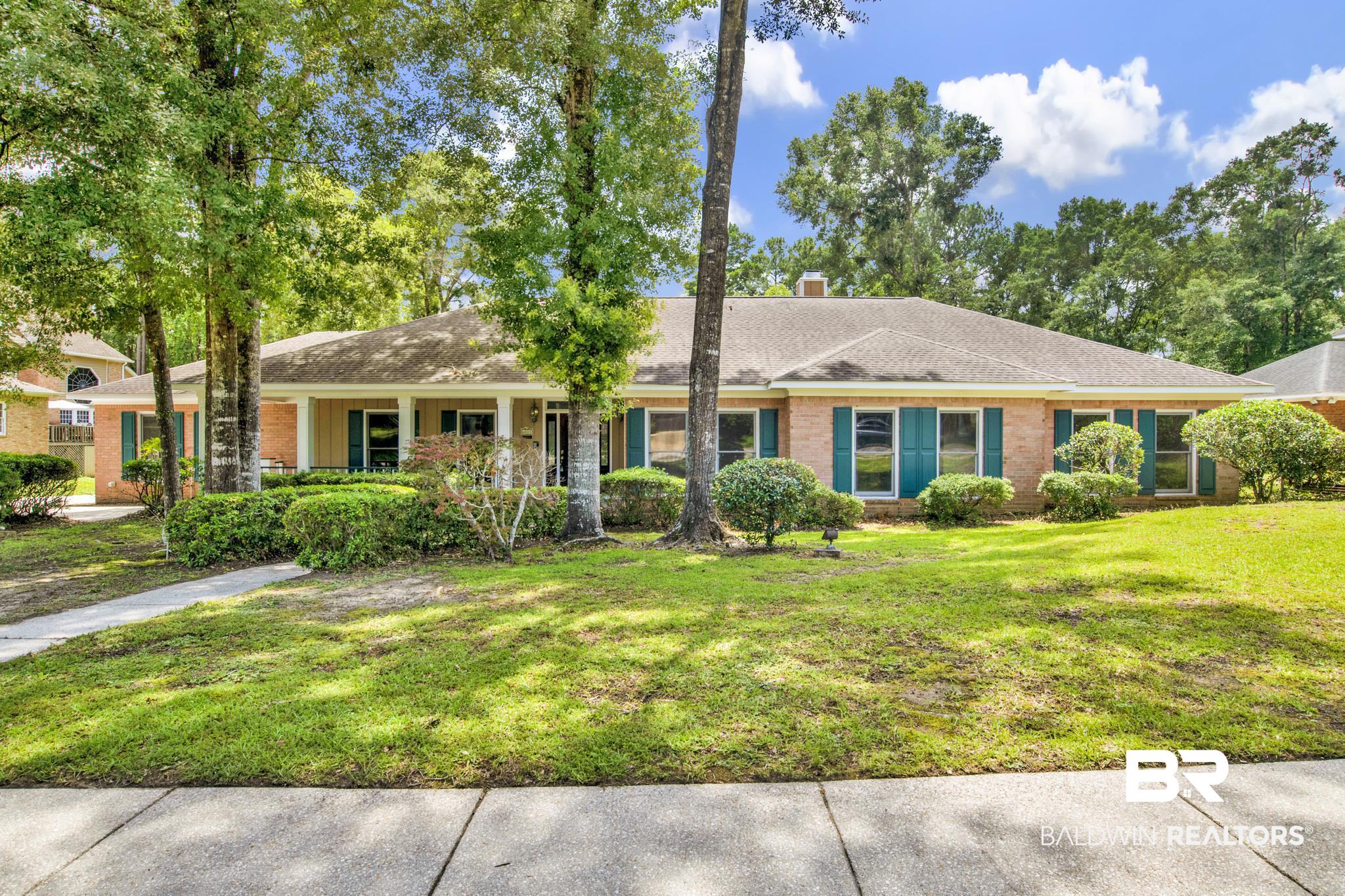 6805 Hunters Court Mobile, AL 36695 - Photo 1 of 37 Ranch-style home featuring a front lawn, a chimney, brick siding, and roof with shingles