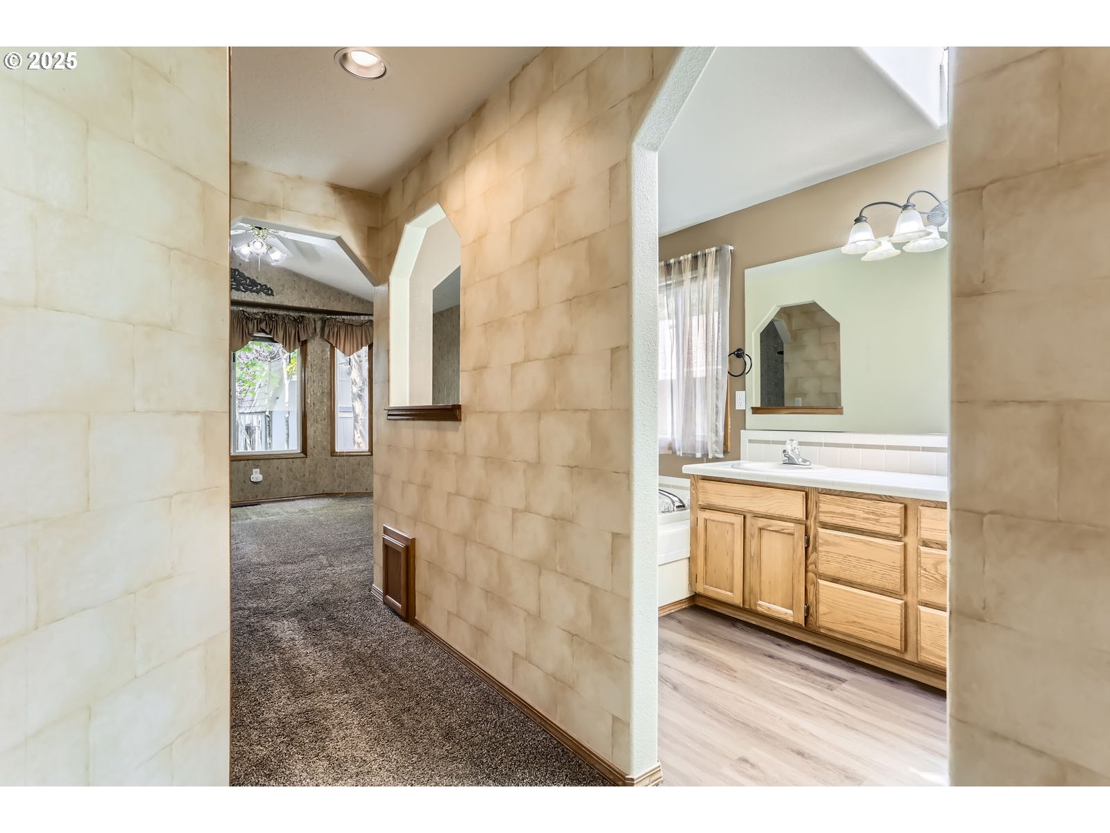257 Southwest Nancy Circle Gresham, OR 97030 - Photo 16 of 36 a bathroom with a sink a mirror and a shower