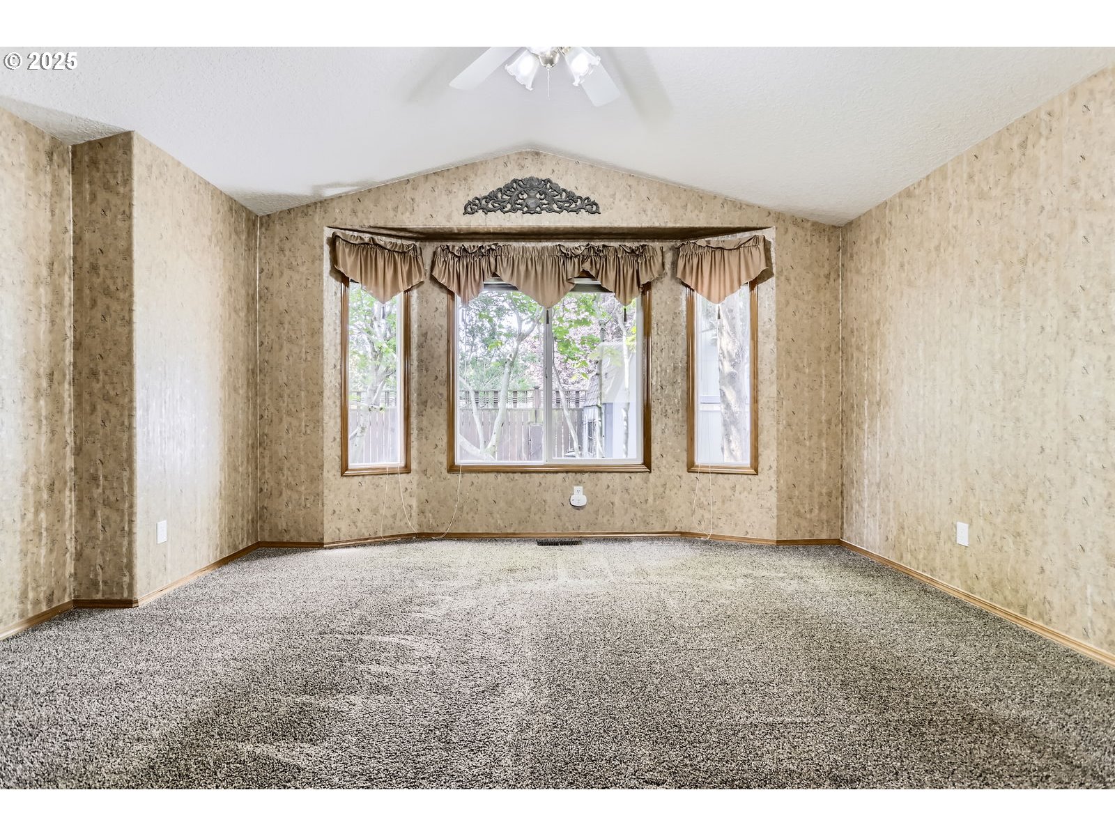 257 Southwest Nancy Circle Gresham, OR 97030 - Photo 17 of 36 a view of an empty room with a window