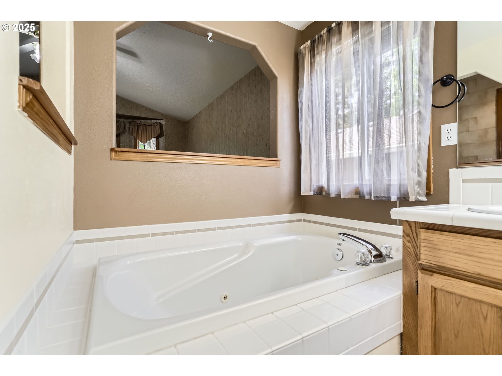 257 Southwest Nancy Circle Gresham, OR 97030 - Photo 21 of 36 a bathroom with a bathtub and a sink