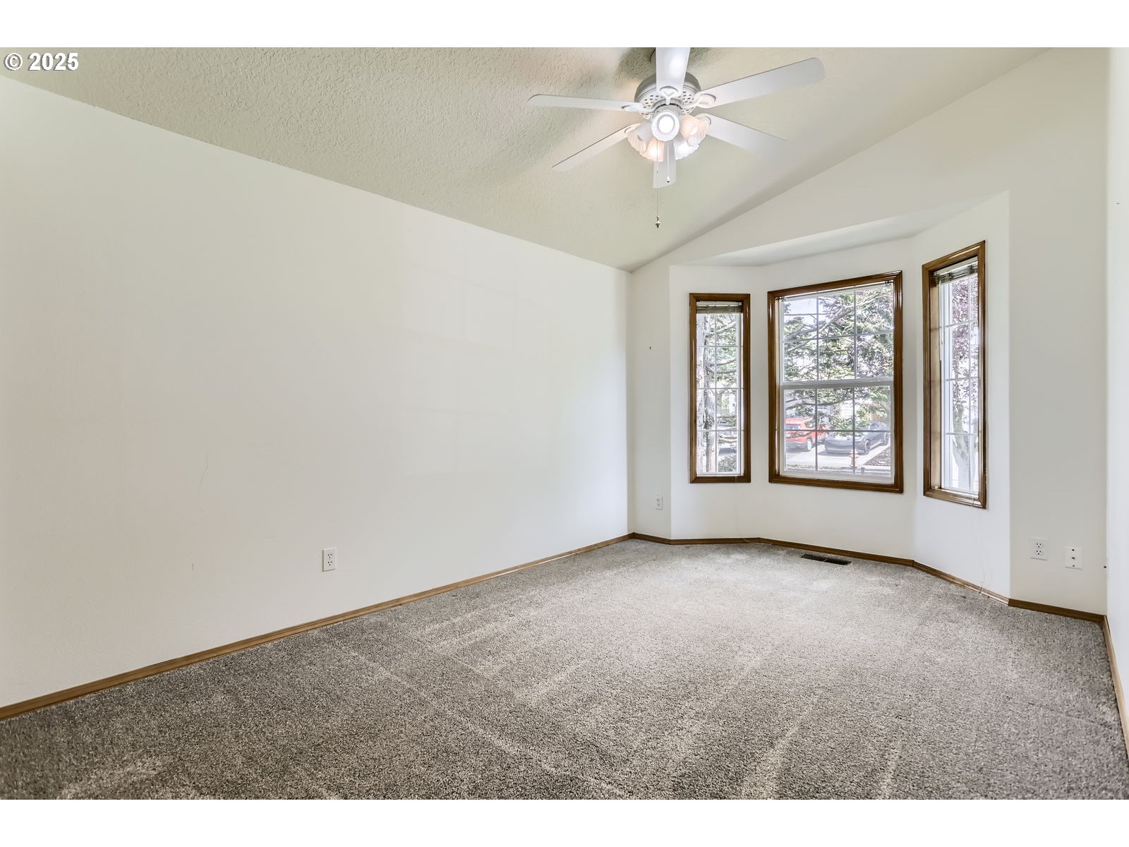 257 Southwest Nancy Circle Gresham, OR 97030 - Photo 23 of 36 a view of an empty room with a window