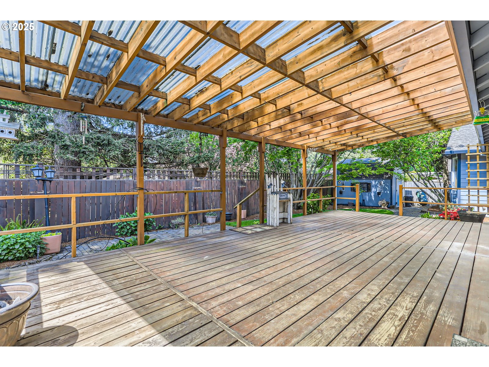 257 Southwest Nancy Circle Gresham, OR 97030 - Photo 25 of 36 a view of outdoor space with wooden floor and roof