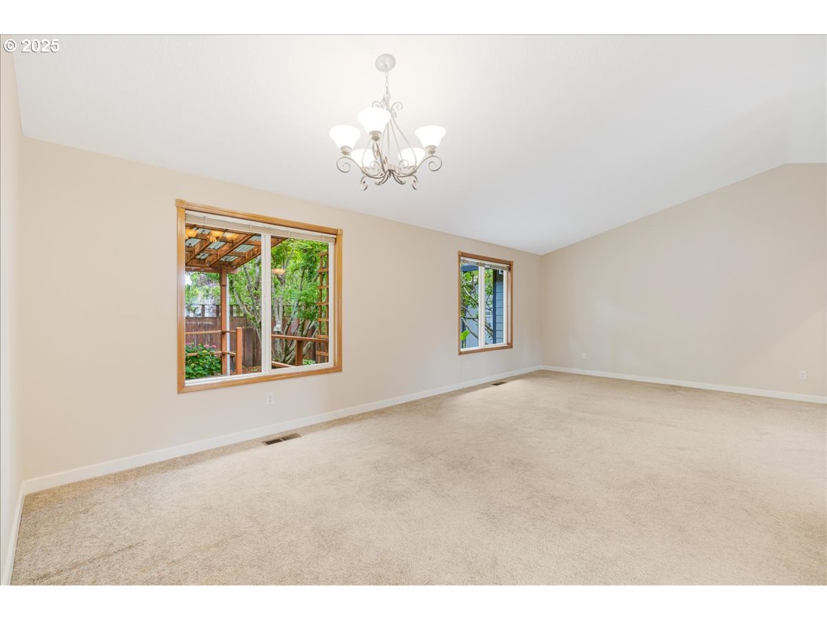 257 Southwest Nancy Circle Gresham, OR 97030 - Photo 31 of 36 a view of an empty room with a window