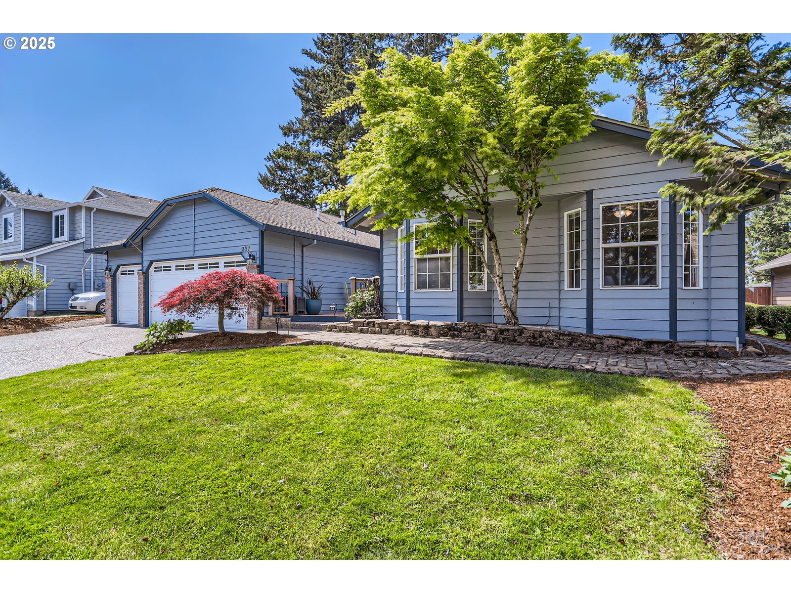 257 Southwest Nancy Circle Gresham, OR 97030 - Photo 4 of 36 a front view of house with yard and seating area