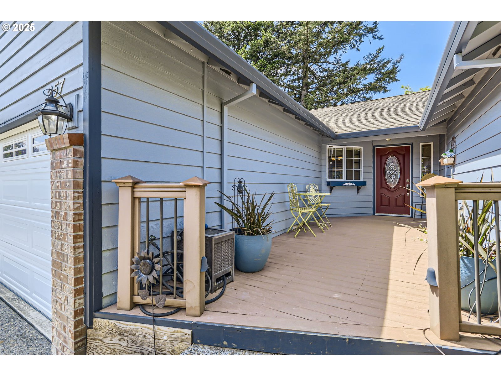 257 Southwest Nancy Circle Gresham, OR 97030 - Photo 5 of 36 a view of a porch with seating space