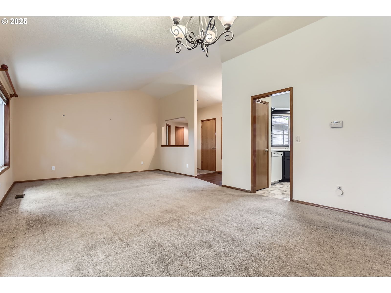 257 Southwest Nancy Circle Gresham, OR 97030 - Photo 8 of 36 a view of an empty room with a window