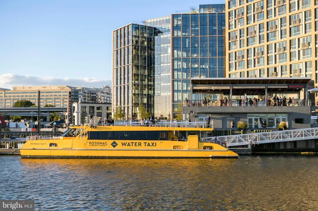 a view of swimming pool with outdoor seating