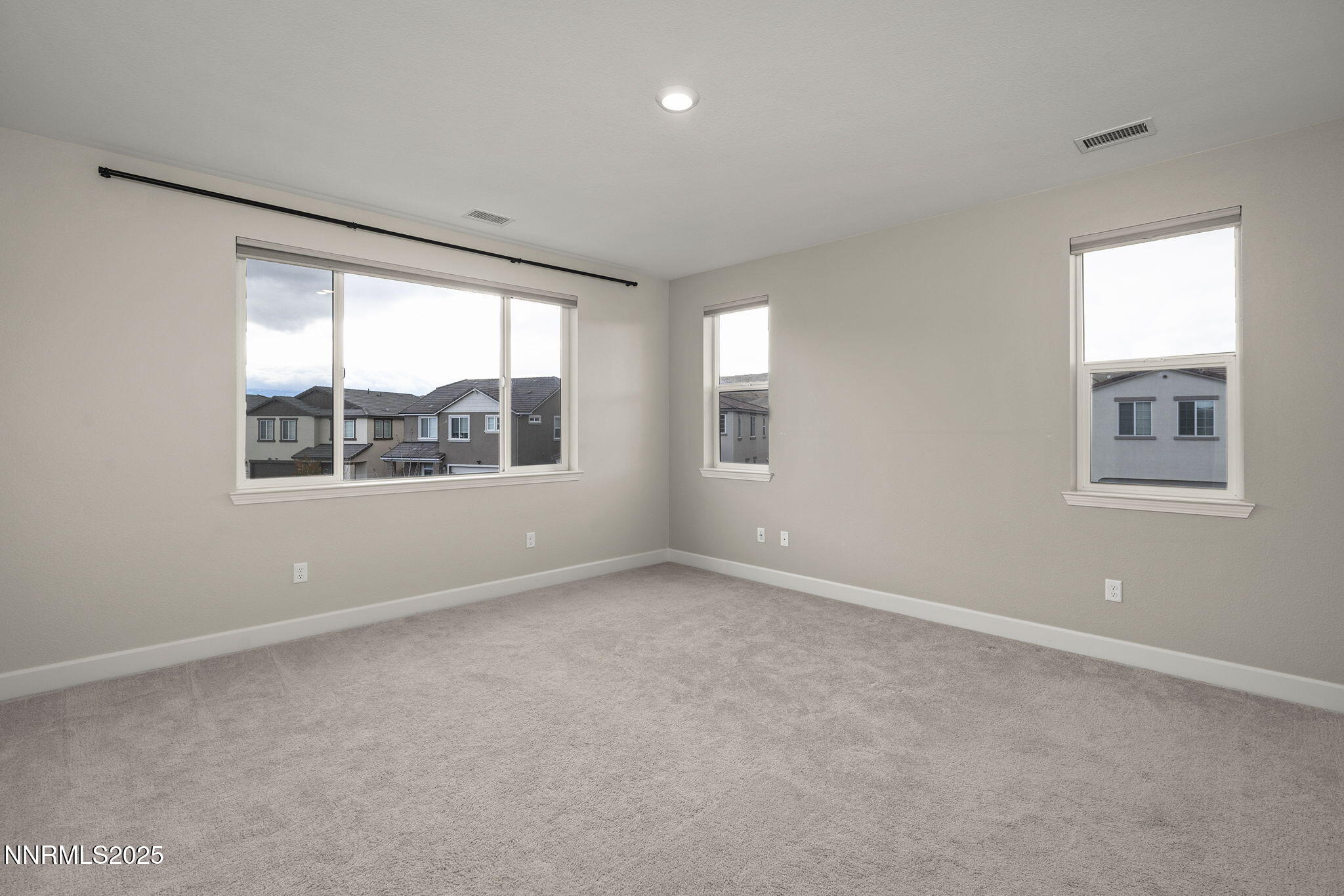 1119 Roswell Road Sparks, NV 89436 - Photo 20 of 35 an empty room with windows