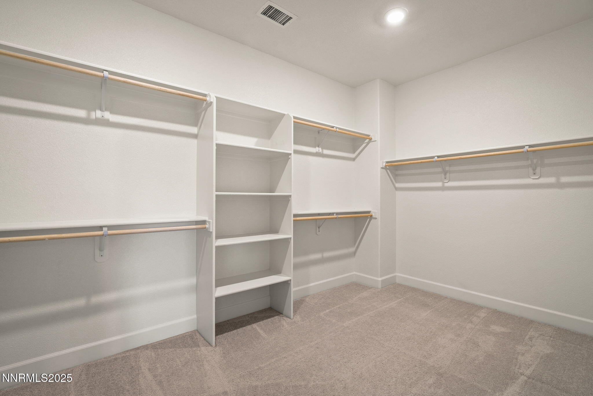 1119 Roswell Road Sparks, NV 89436 - Photo 24 of 35 a view of an empty walk in closet