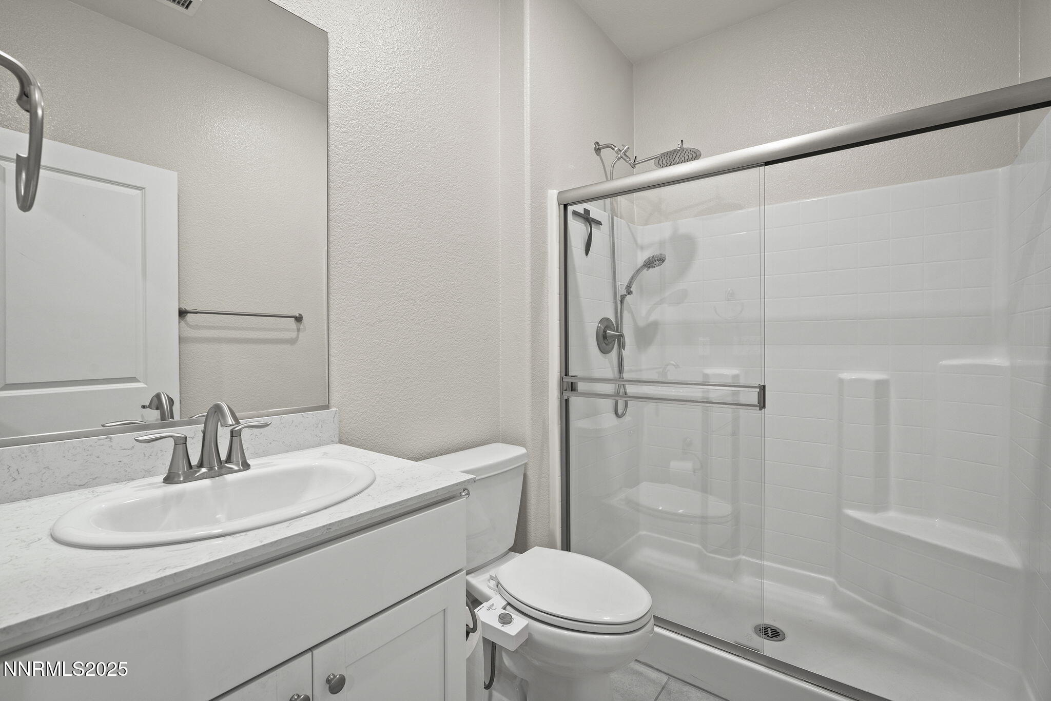 1119 Roswell Road Sparks, NV 89436 - Photo 26 of 35 a bathroom with a sink toilet and shower