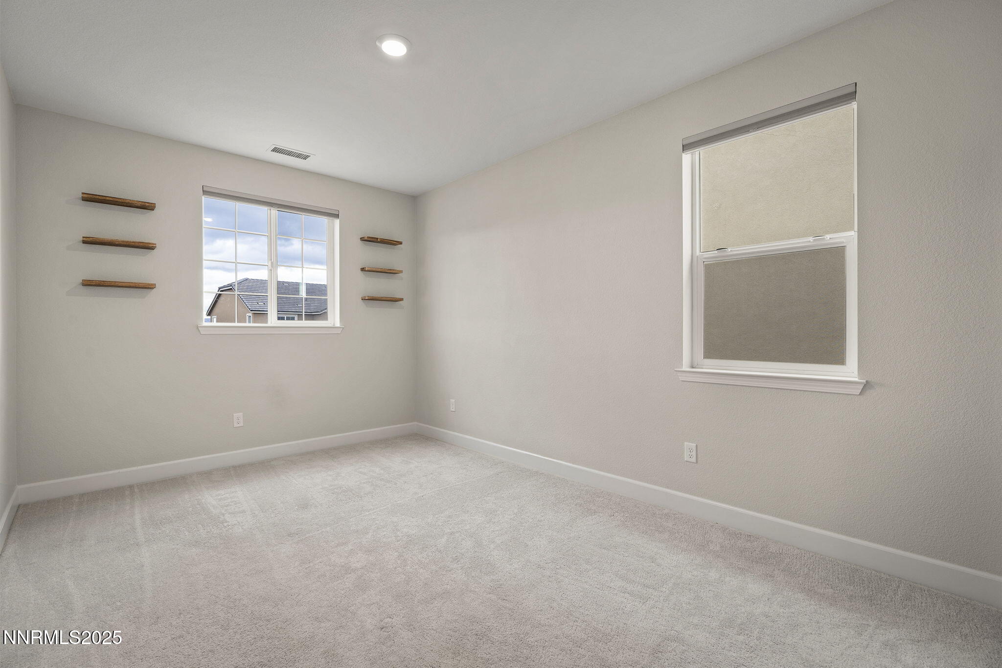 1119 Roswell Road Sparks, NV 89436 - Photo 28 of 35 an empty room with a window