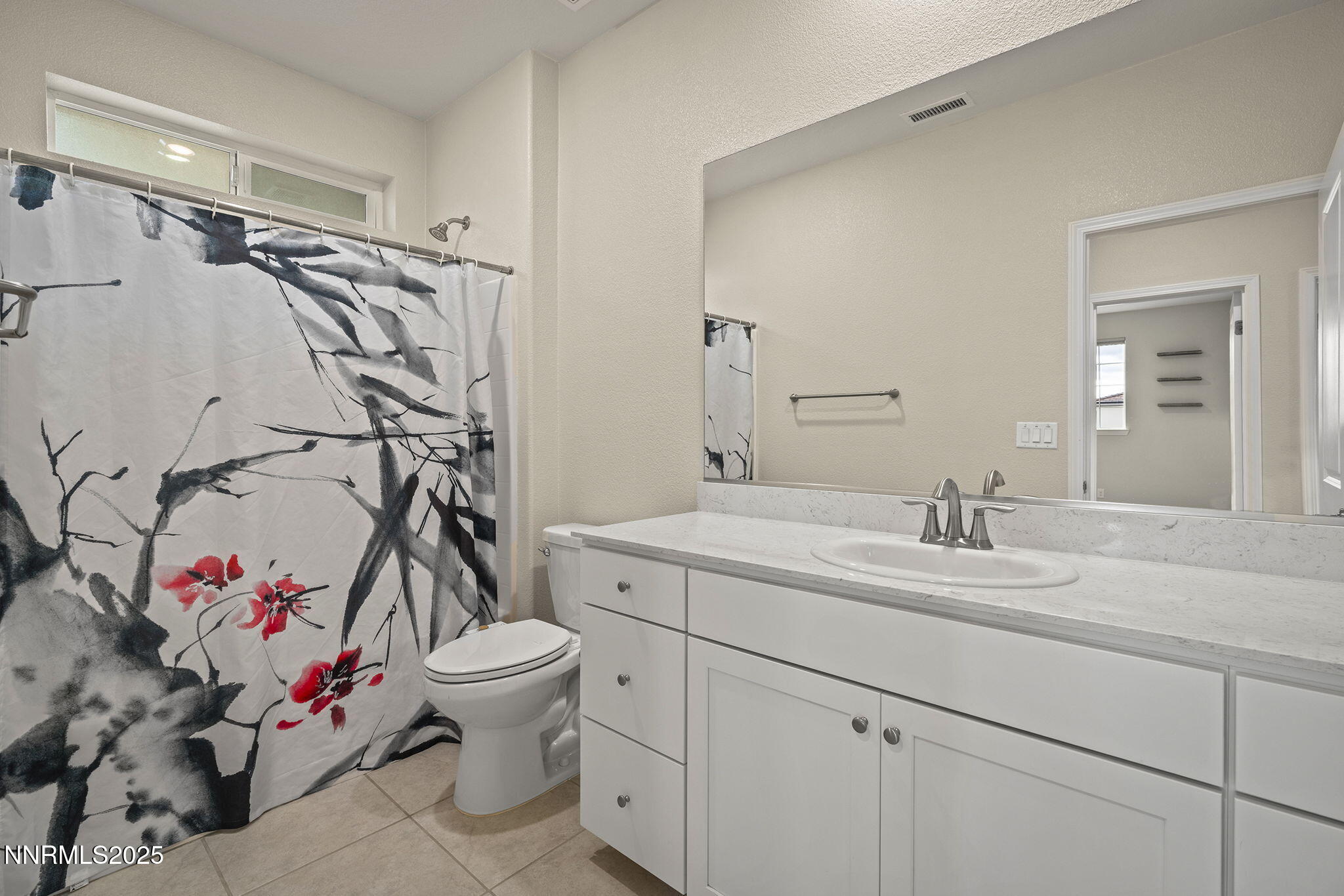 1119 Roswell Road Sparks, NV 89436 - Photo 29 of 35 a bathroom with a sink toilet and shower