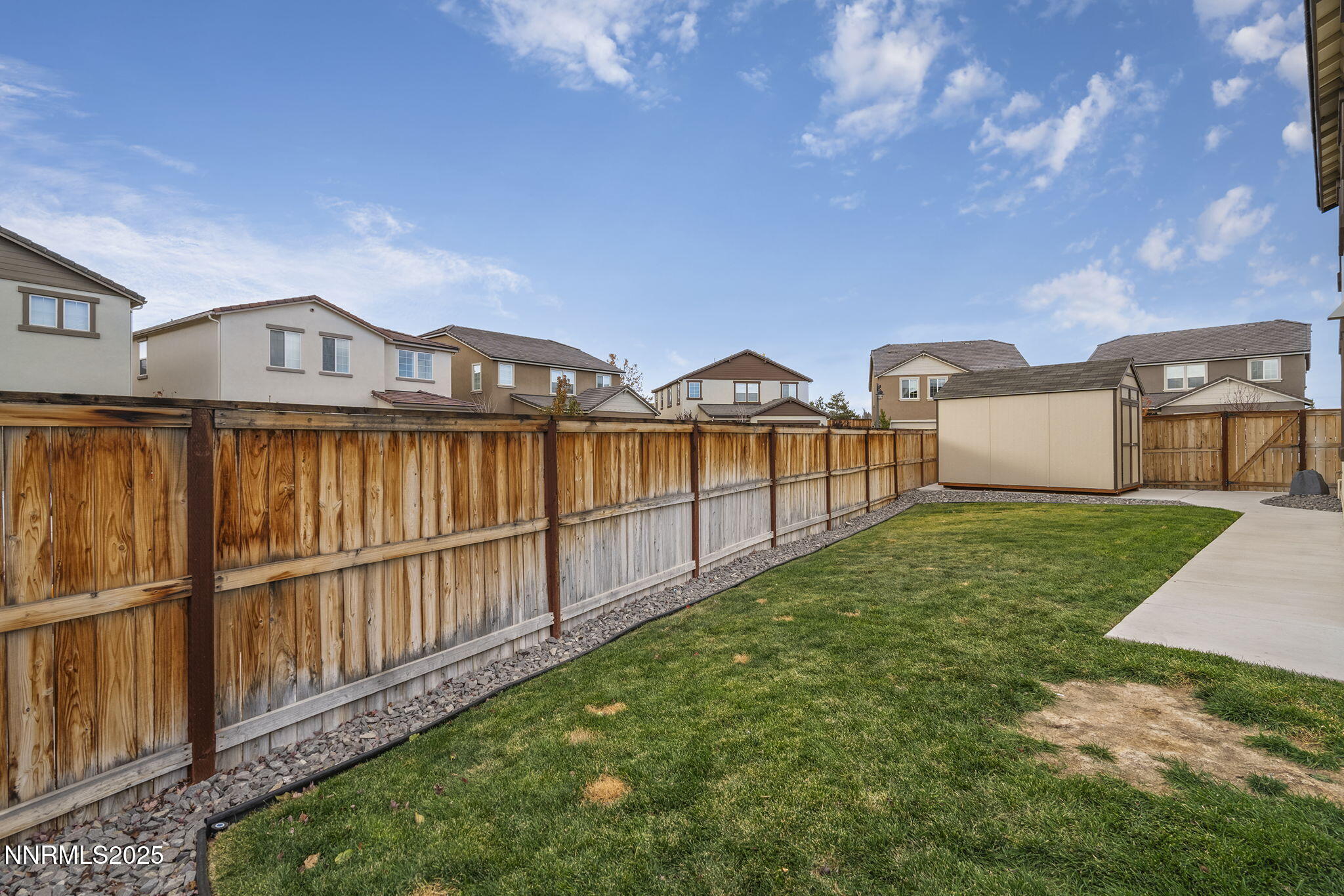 1119 Roswell Road Sparks, NV 89436 - Photo 34 of 35 a view of a house with wooden fence
