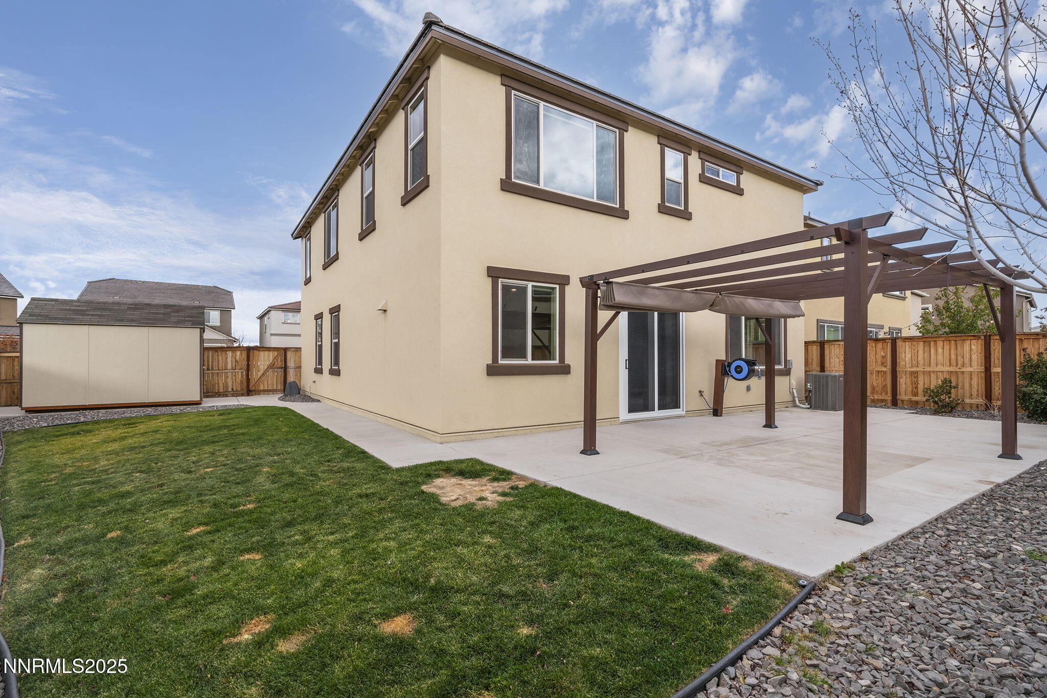 1119 Roswell Road Sparks, NV 89436 - Photo 35 of 35 a front view of a house with garden