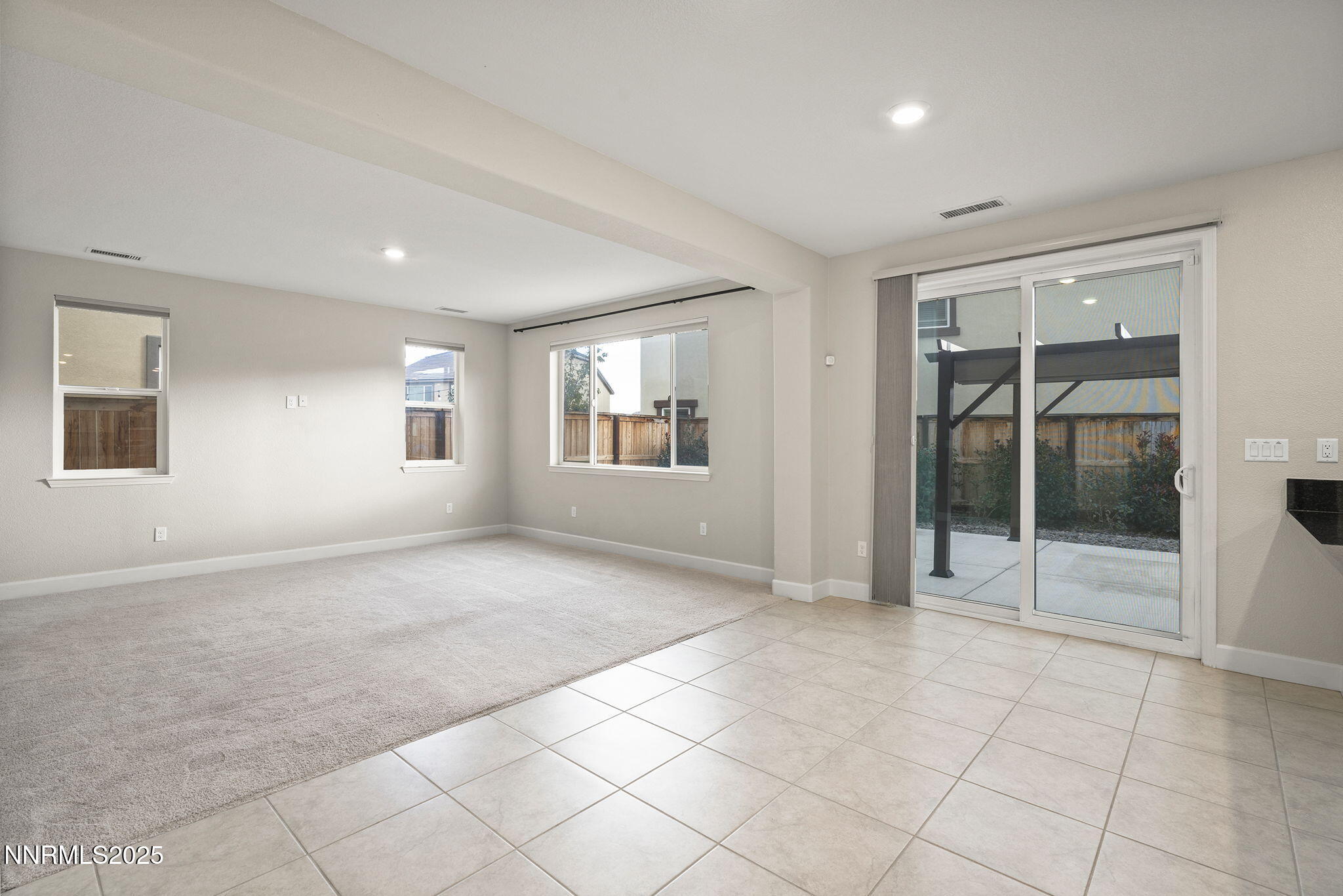 1119 Roswell Road Sparks, NV 89436 - Photo 5 of 35 a view of an empty room with glass door