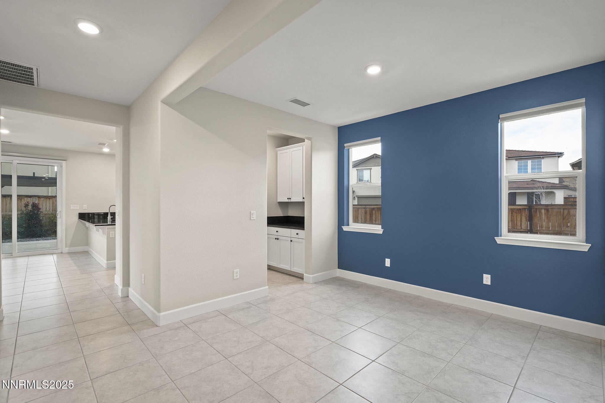 1119 Roswell Road Sparks, NV 89436 - Photo 7 of 35 a view of livingroom with an empty space and a window