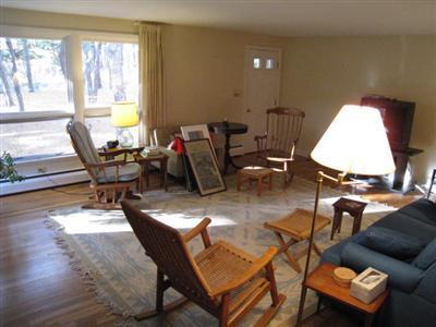45 Cranberry Hollow Road Wellfleet, MA 02667 - Photo 16 of 26 a living room with furniture and a large window