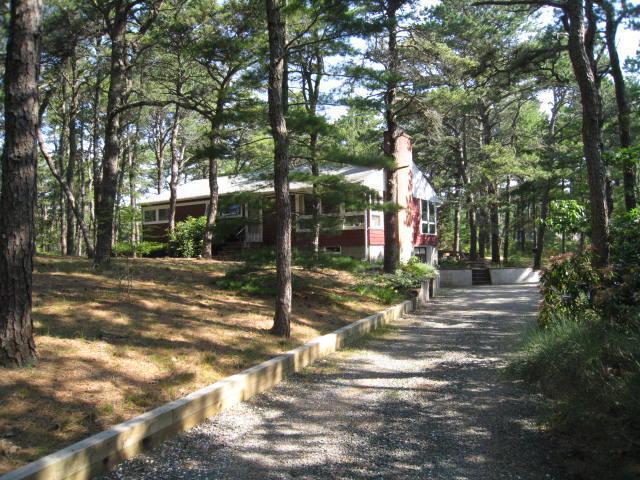 45 Cranberry Hollow Road Wellfleet, MA 02667 - Photo 4 of 26 a view of a house with yard and tree s